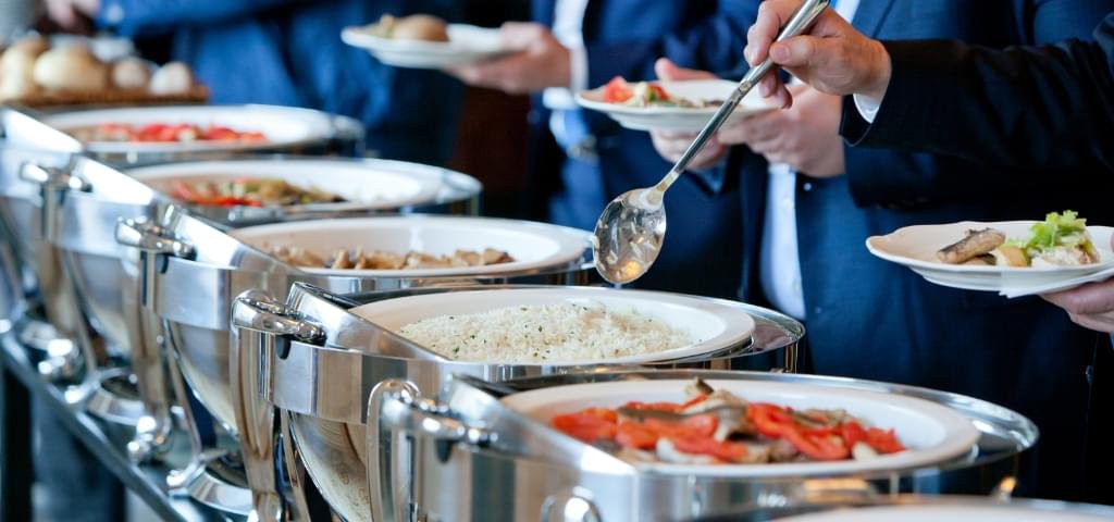 Food at a buffet line.